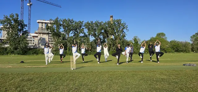 GQ United CC team practicing yoga and fitness training sessions